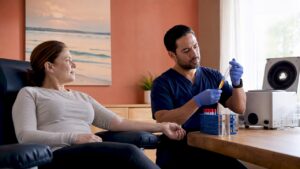 Patient and doctor preparing PRP injection