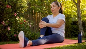 Woman doing knee stretches at home